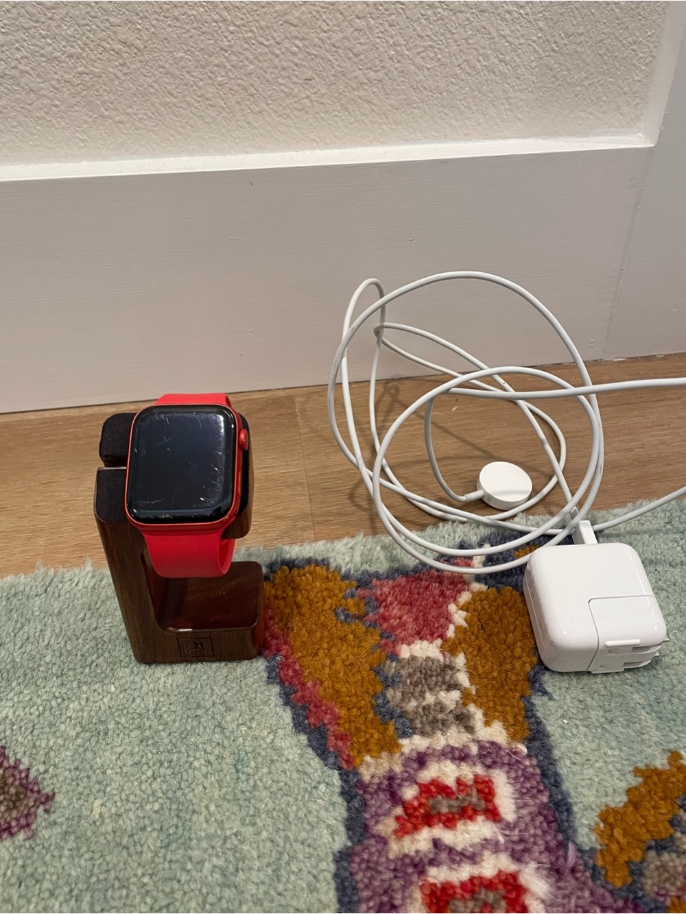 Apple Watch Series 6 44mm Red Product with Stand and Charger